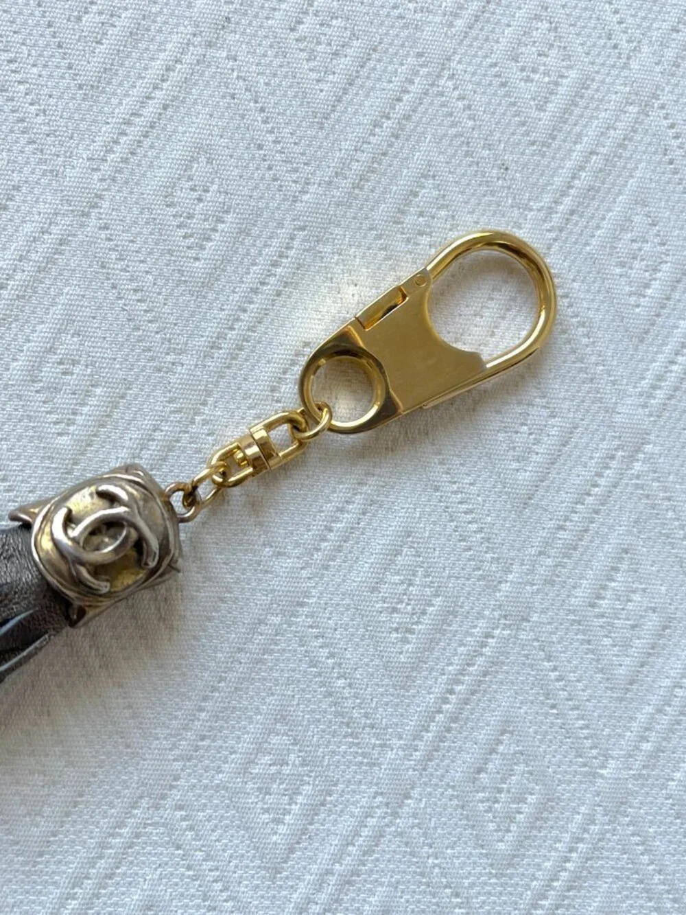 CC keychain gold with bronze leather fringe vintage